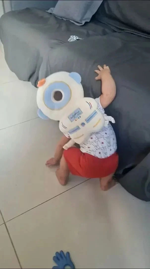 Baby wearing the Astronaut Snugjooy baby head protector, parent review